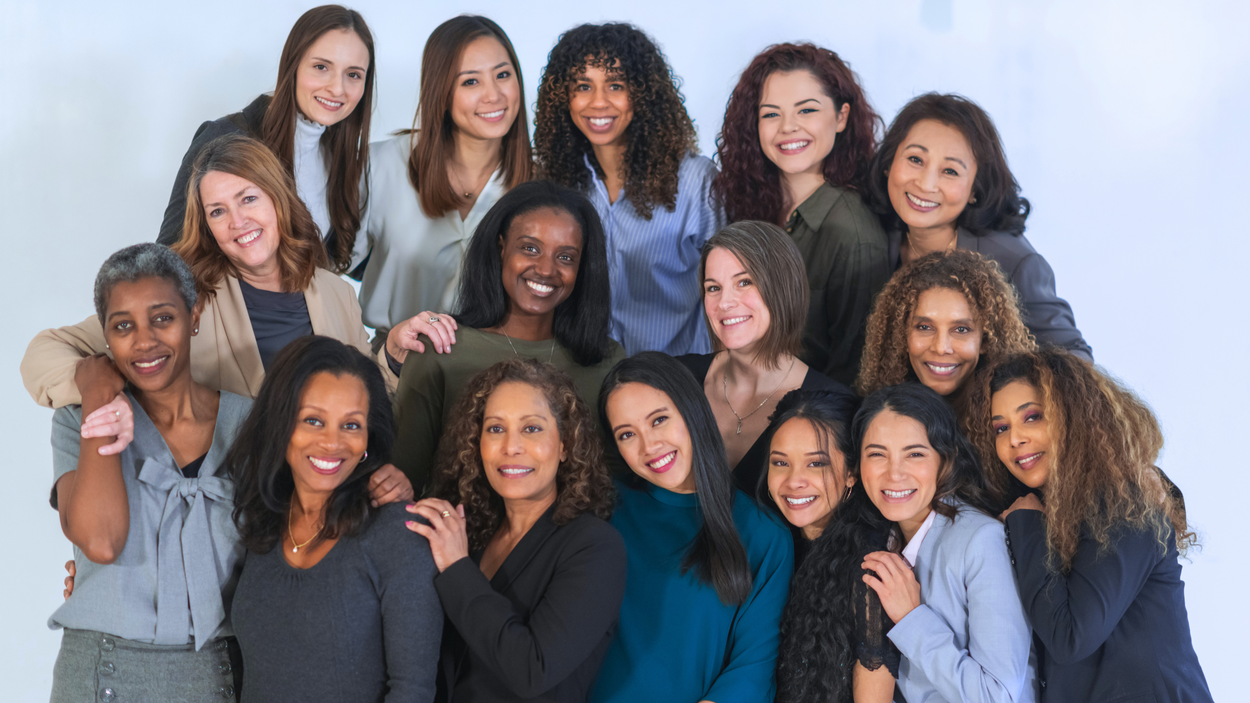 Call to Action A large group of women smiling at the camera