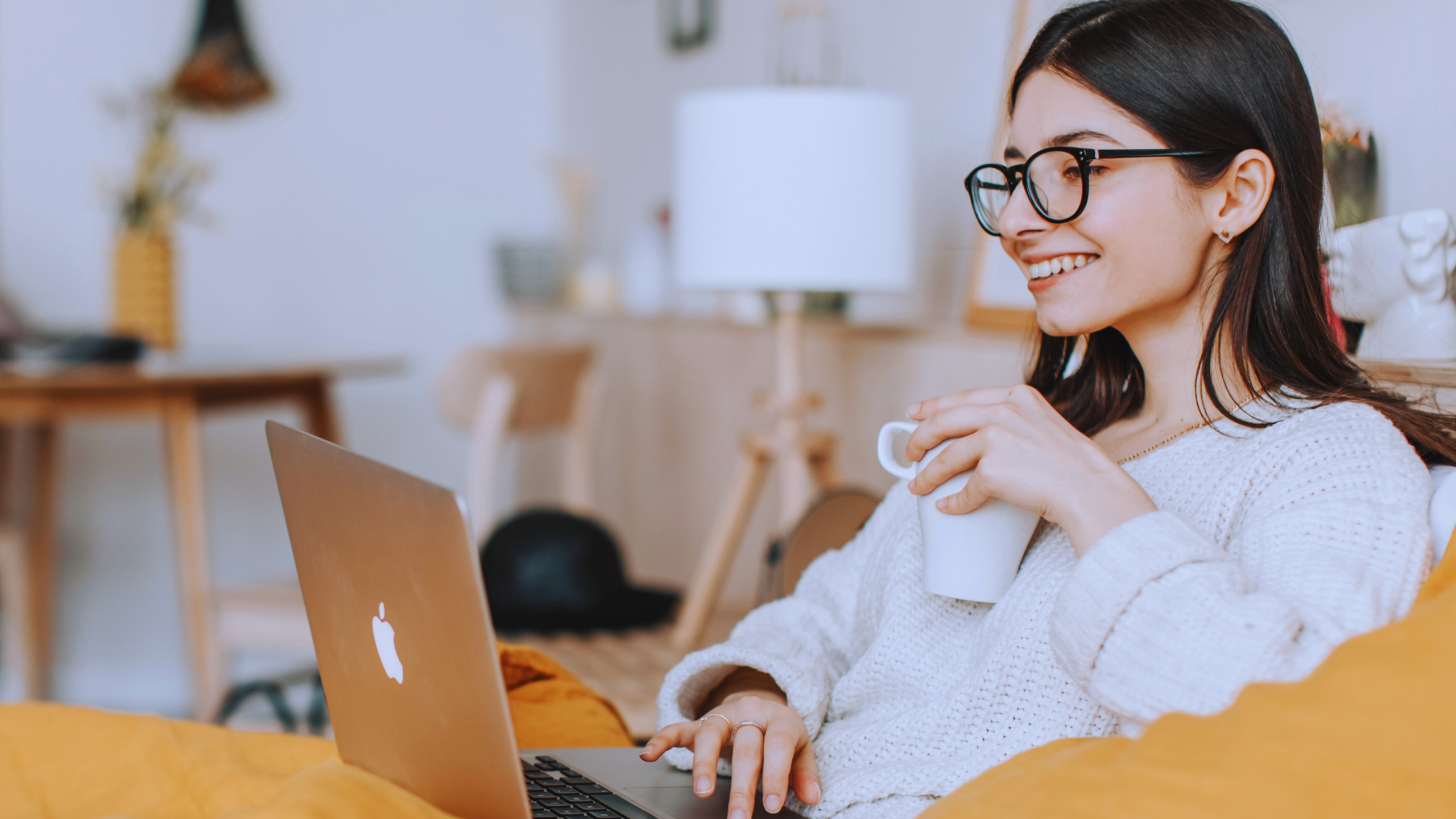 Woman sitting at a laptop