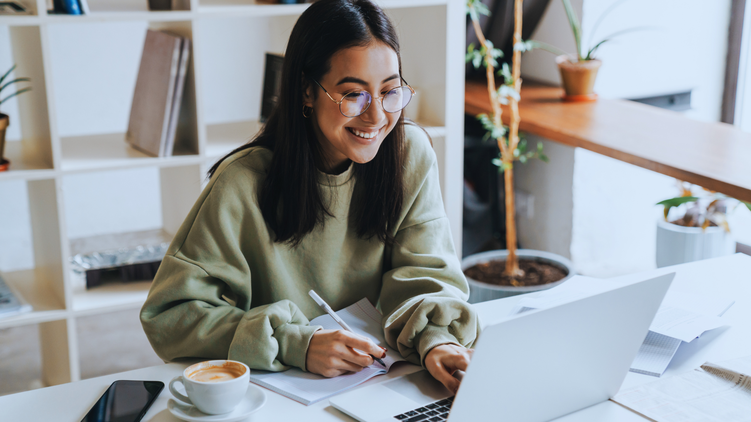Woman sitting at a laptop